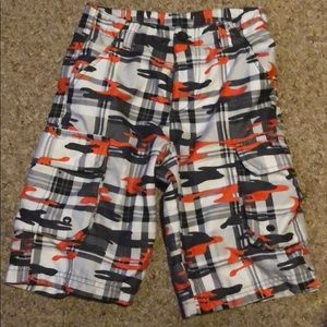 Orange and Gray camo shorts. 100% Polyester